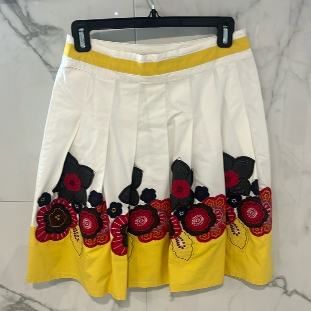 Women’s yellow and white shirt